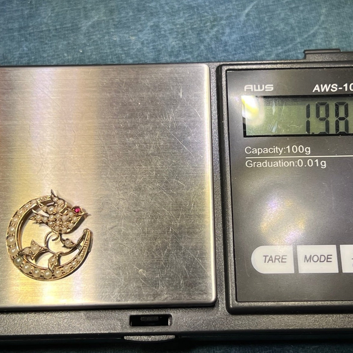 10k White Gold Pearl Crescent Moon + Sparrow Bird Pendant. Ruby