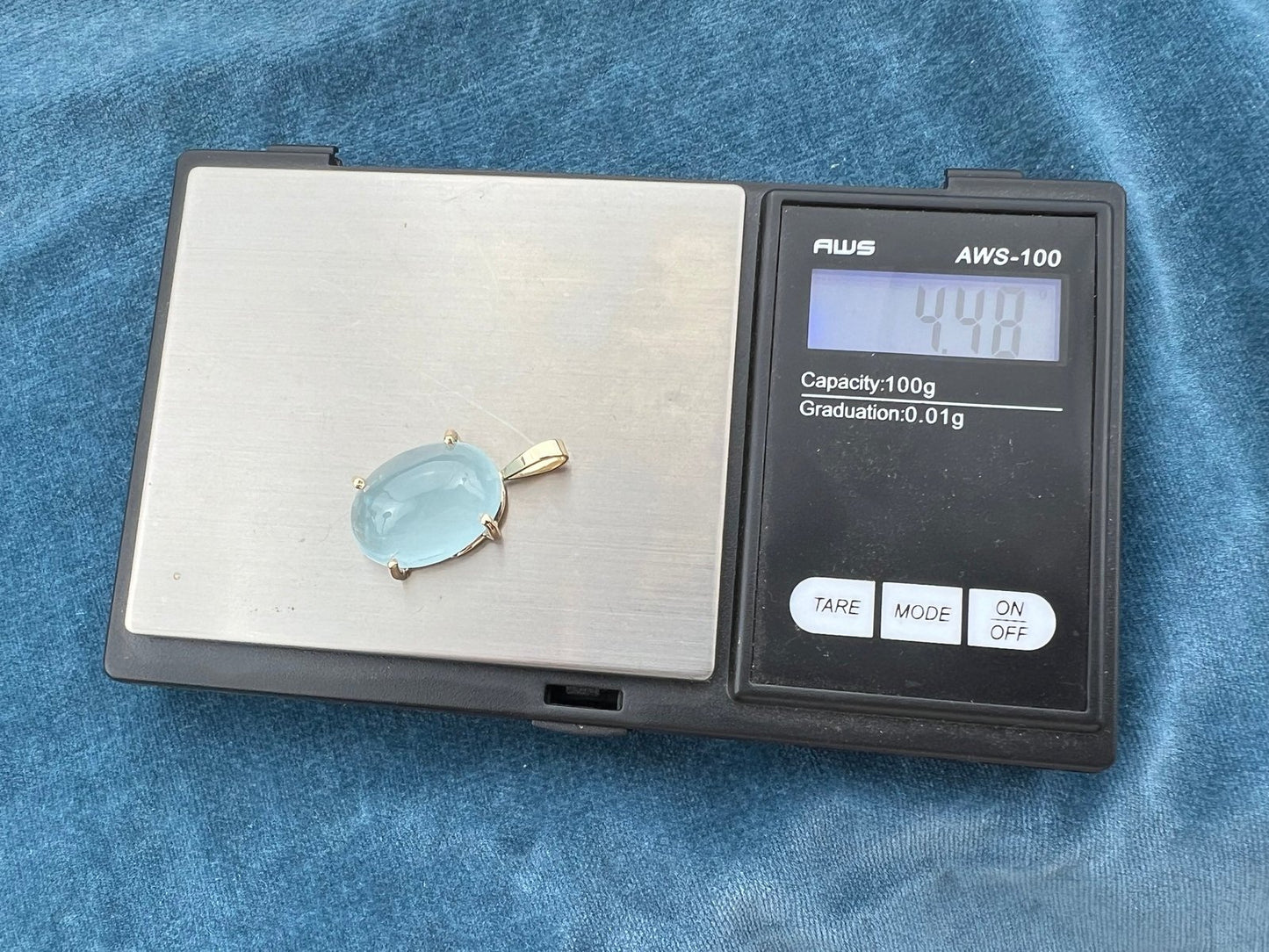 14k Gold Cabochon Baby Sky Blue Topaz Pendant. 1.1"