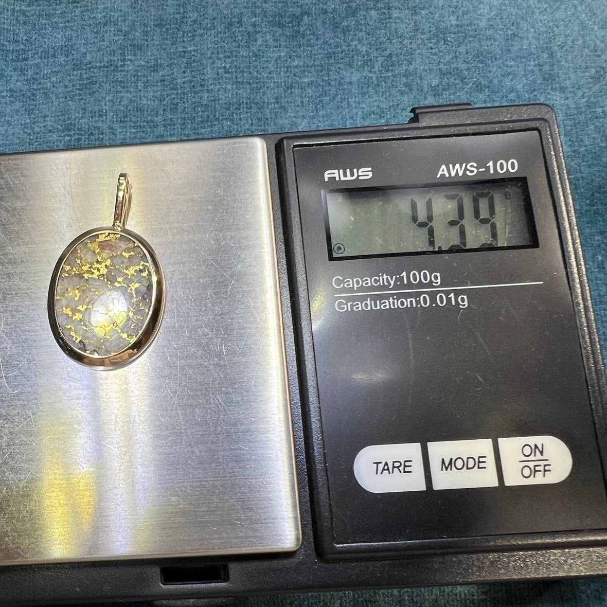 14k Yellow Gold ALASKAN Gold in Quartz Oval Disk Pendant. N-S