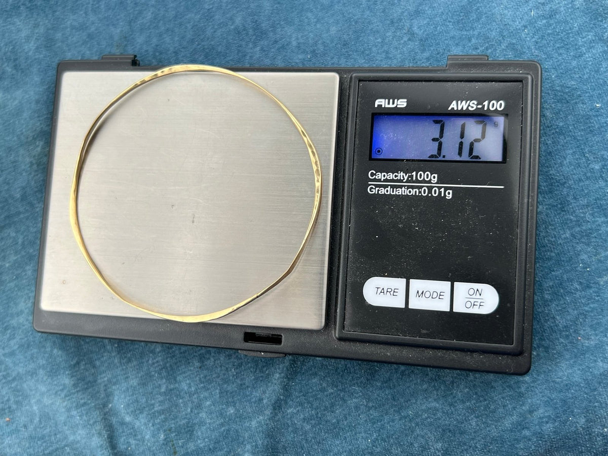 14k Yellow Gold Hammered Twisted Bangle Bracelet. Designer