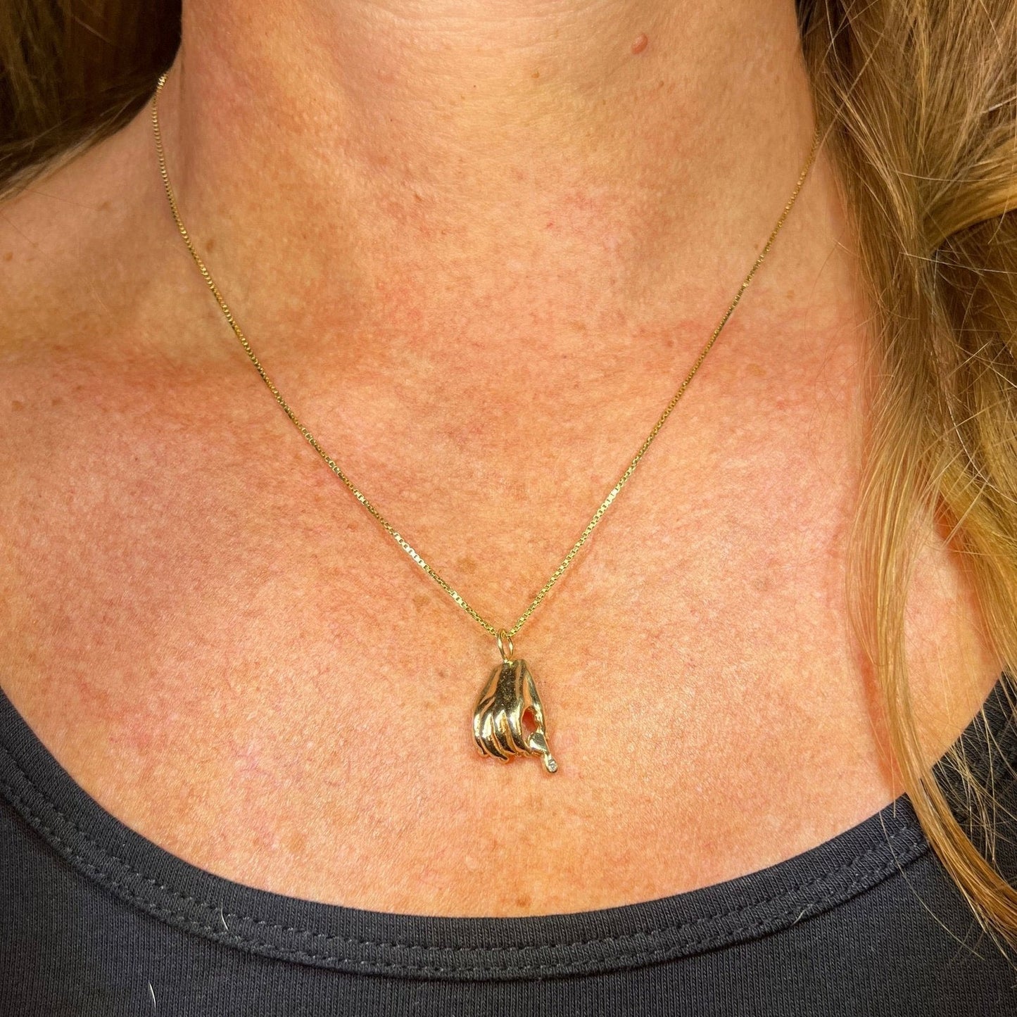 14k Yellow Gold Jeweler's Hand Holding Diamond Loupe Pendant. 1"