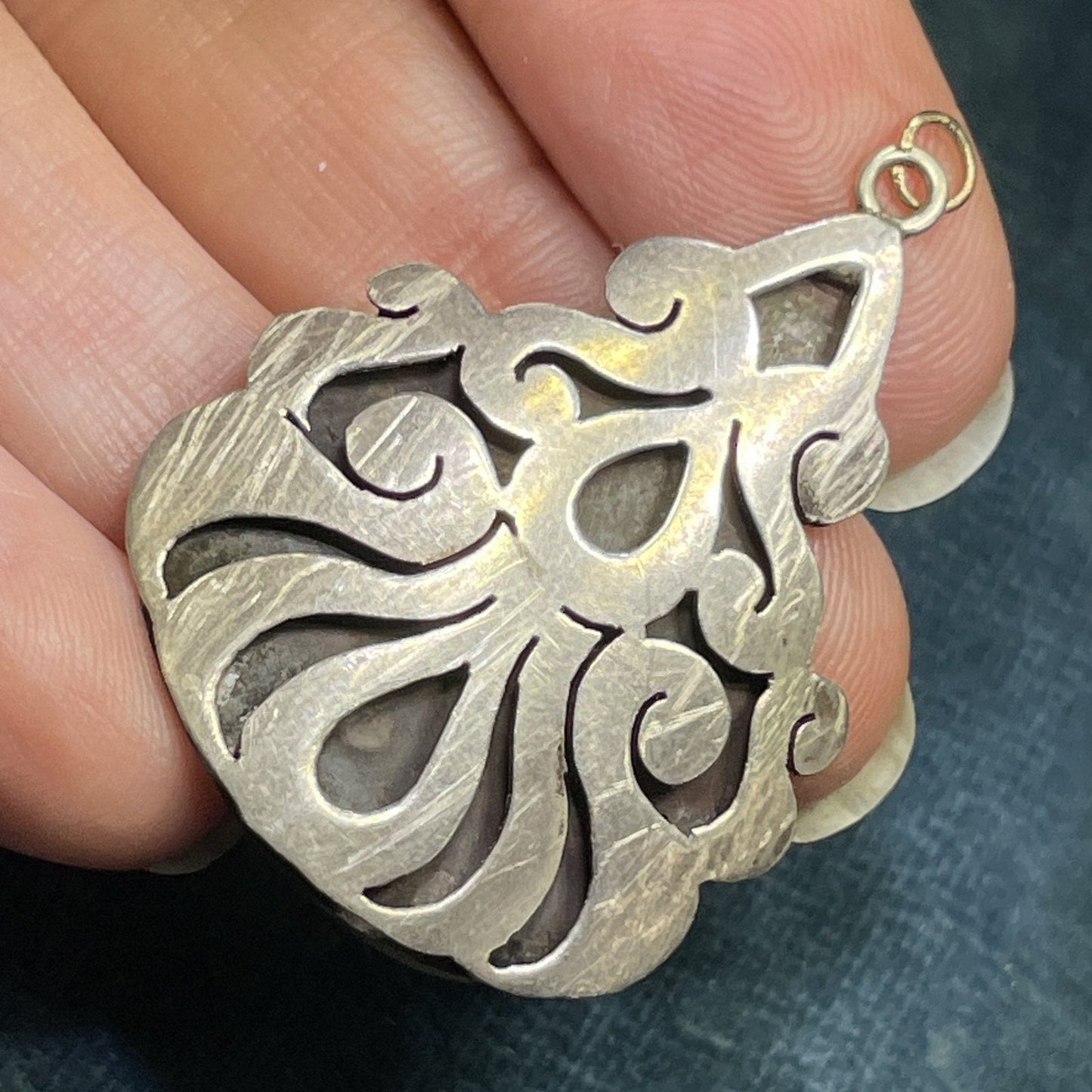 Antique Mexican Medallion Cut-Out Teardrop Pendant. 1.5"