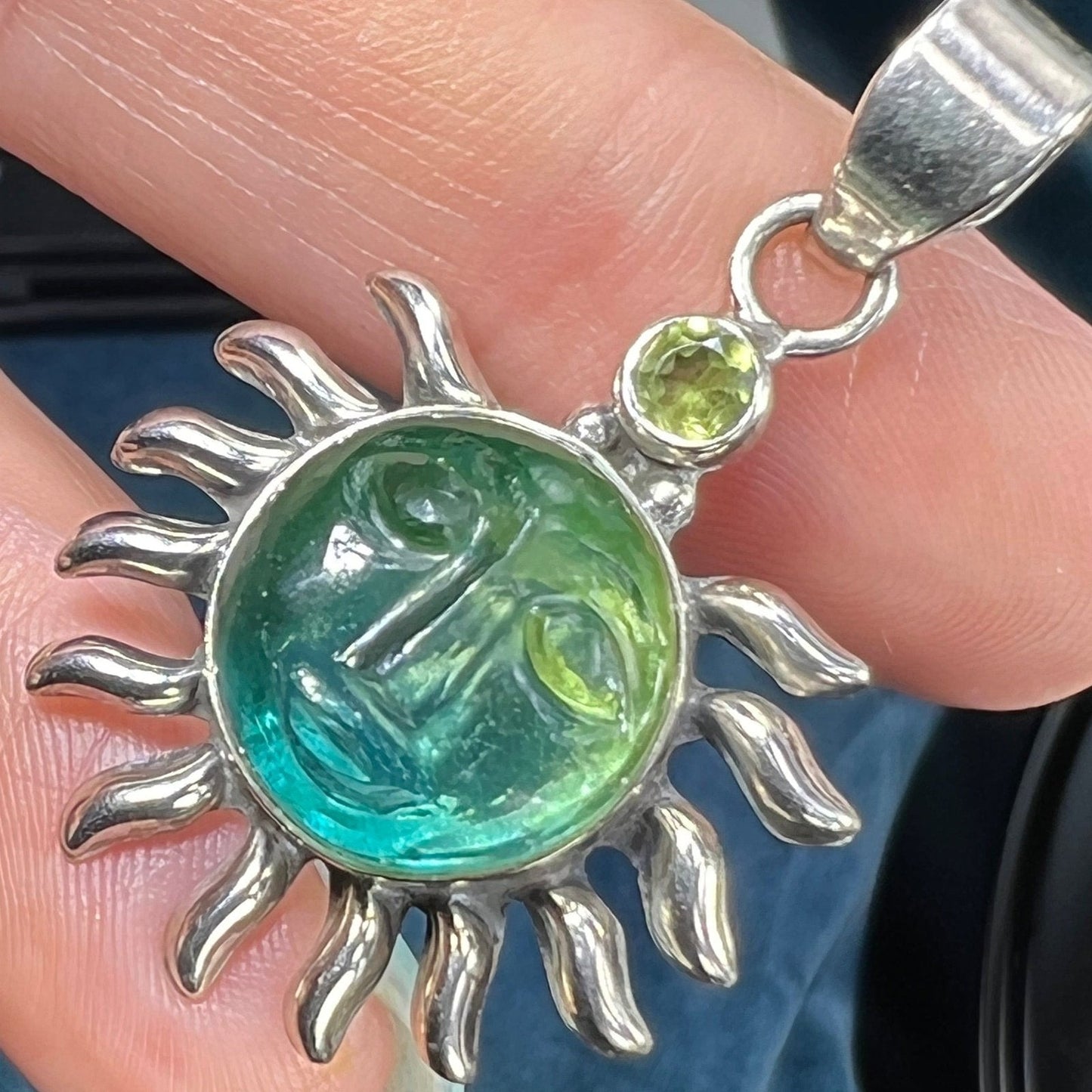 Carved Blue Green Quartz Man in the Moon Sunburst Pendant