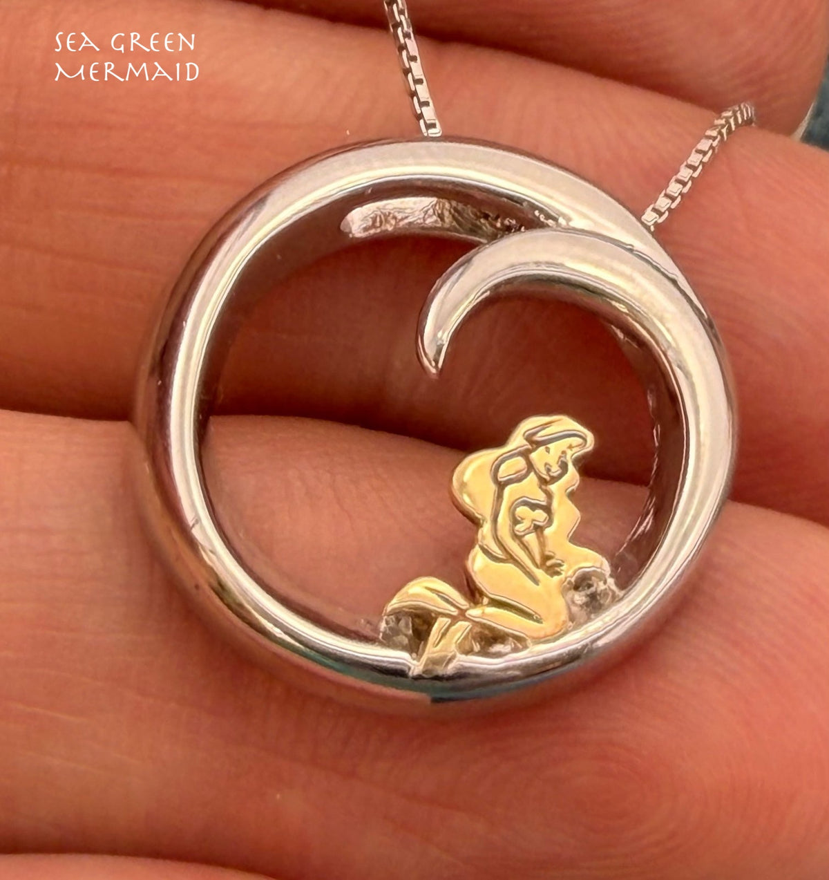 10k Gold Little Mermaid in Silver Ocean Wave Circle Pendant. Free Chain