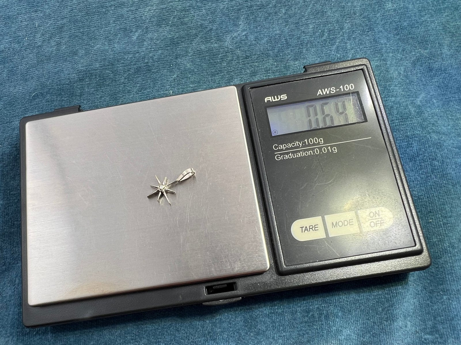 10k White Gold Diamond North Star Starburst Pendant. Tiny!