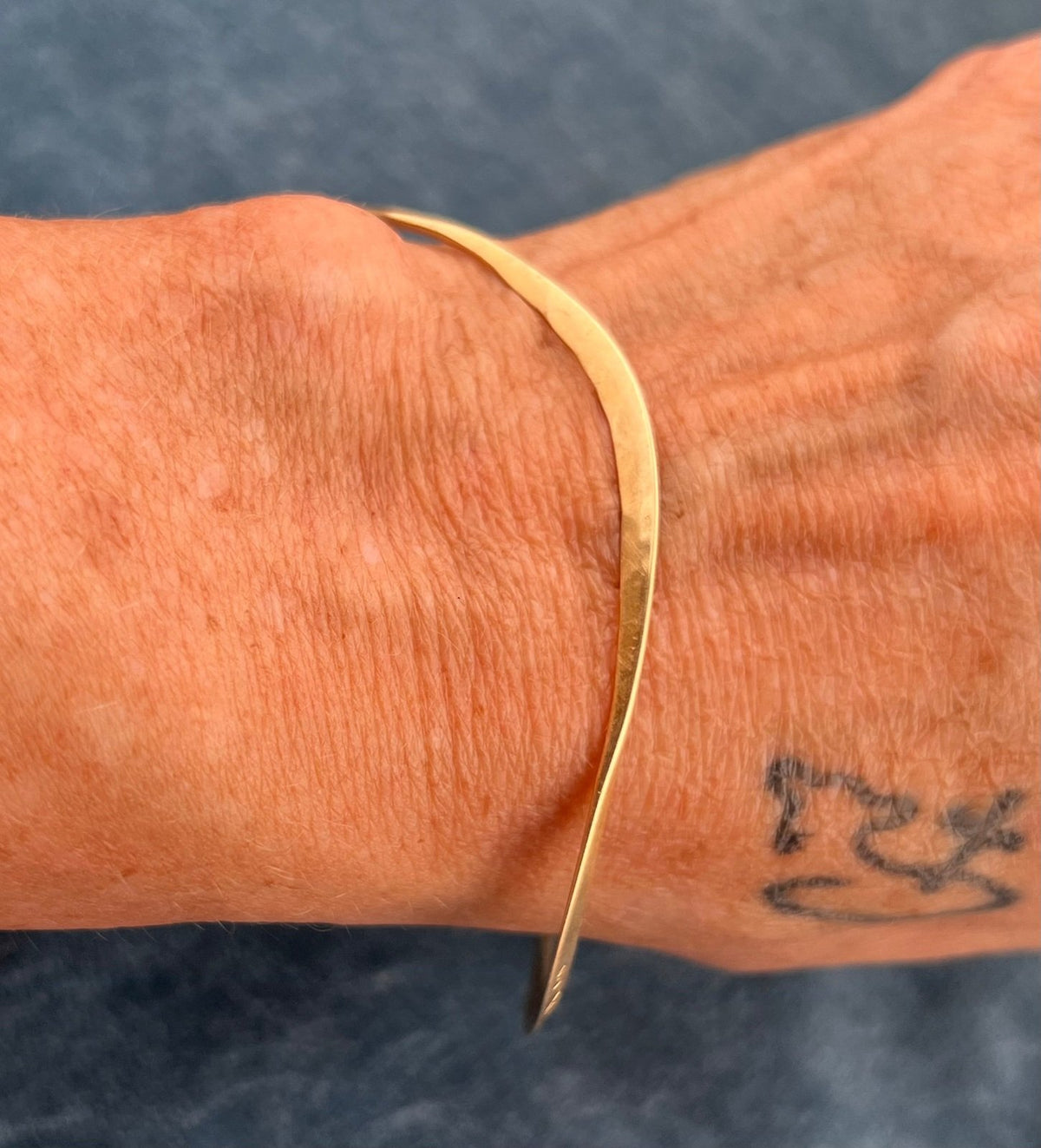 14k Gold Hammered Bangle Bracelet. Designer JA.