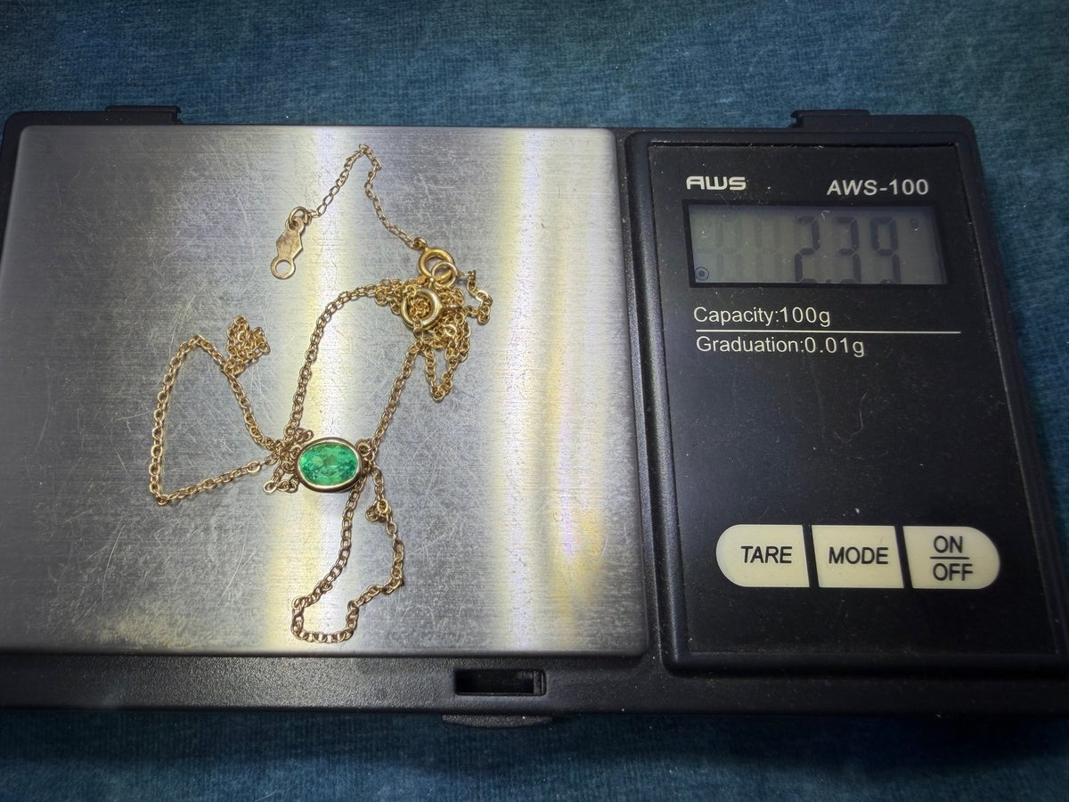 14k Gold Natural Oval Emerald Pendant Necklace. Bezel-Set. 16" Chain