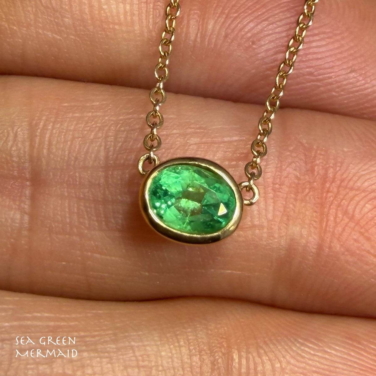 14k Gold Natural Oval Emerald Pendant Necklace. Bezel-Set. 16" Chain