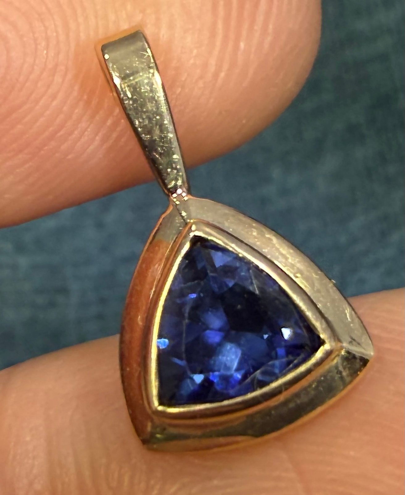 14k Yellow Gold Blue Lab-Created Sapphire Pendant. Trillion Bezel