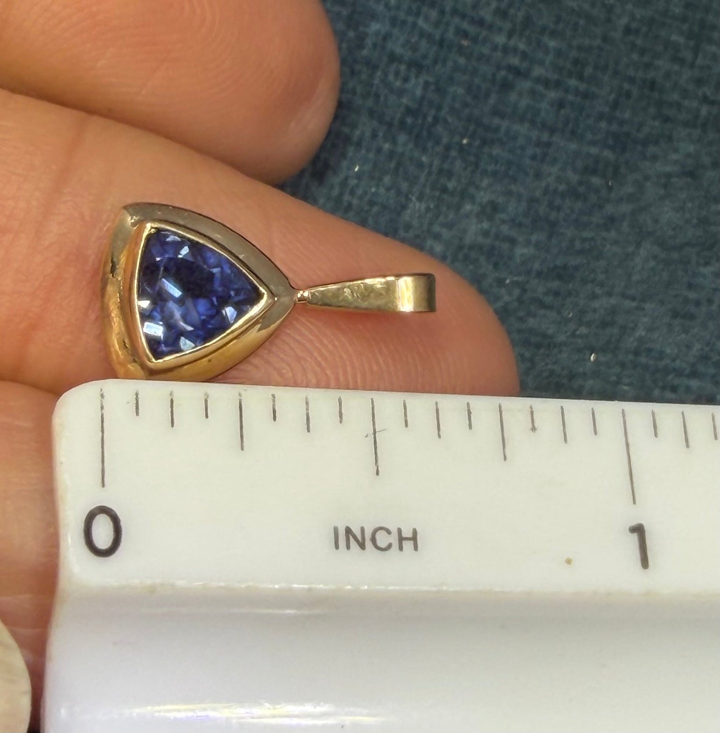 14k Yellow Gold Blue Lab-Created Sapphire Pendant. Trillion Bezel