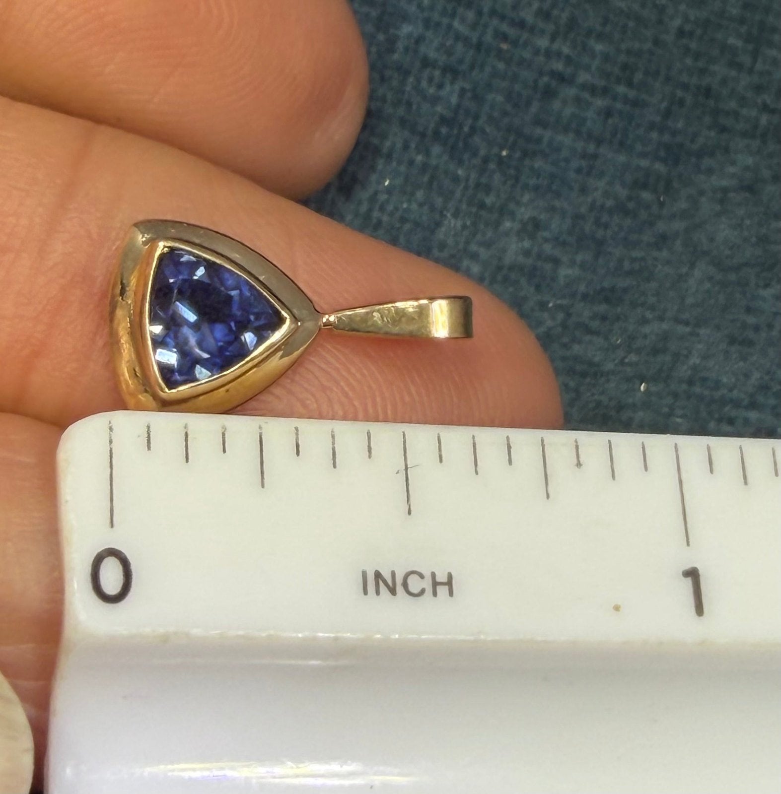 14k Yellow Gold Blue Lab-Created Sapphire Pendant. Trillion Bezel