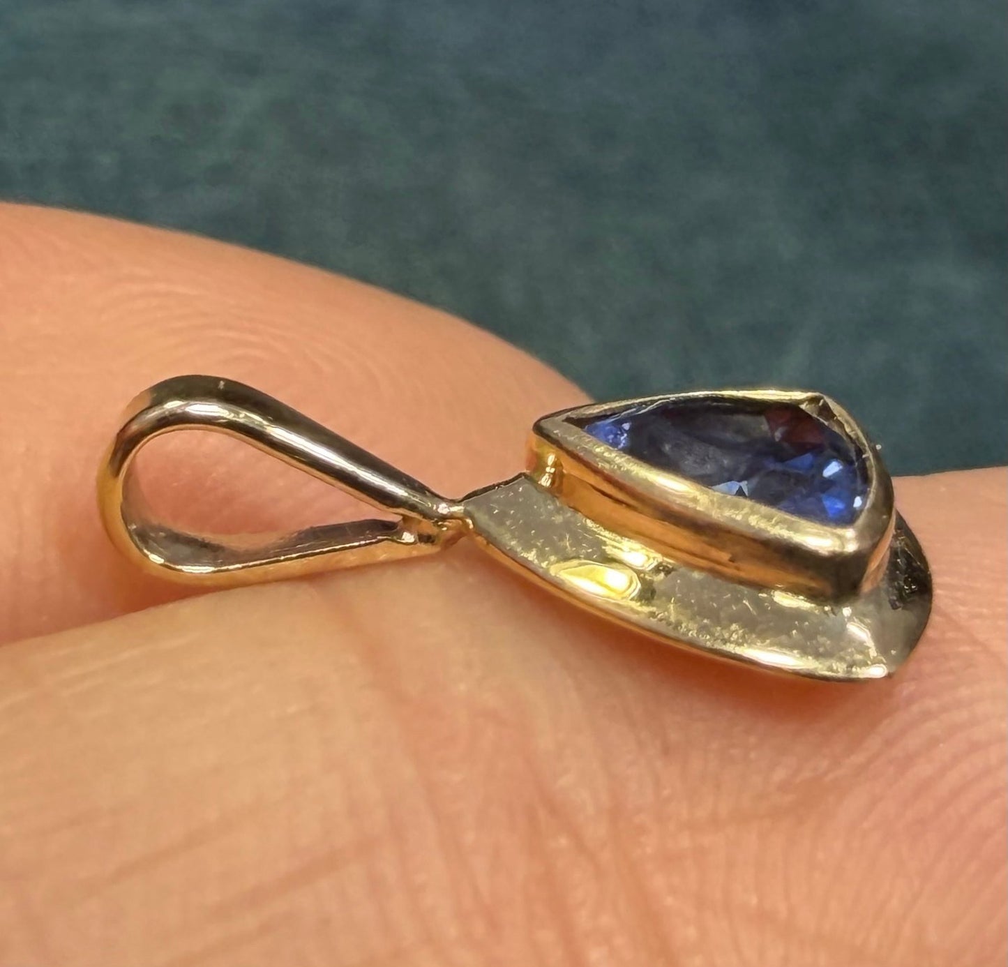 14k Yellow Gold Blue Lab-Created Sapphire Pendant. Trillion Bezel