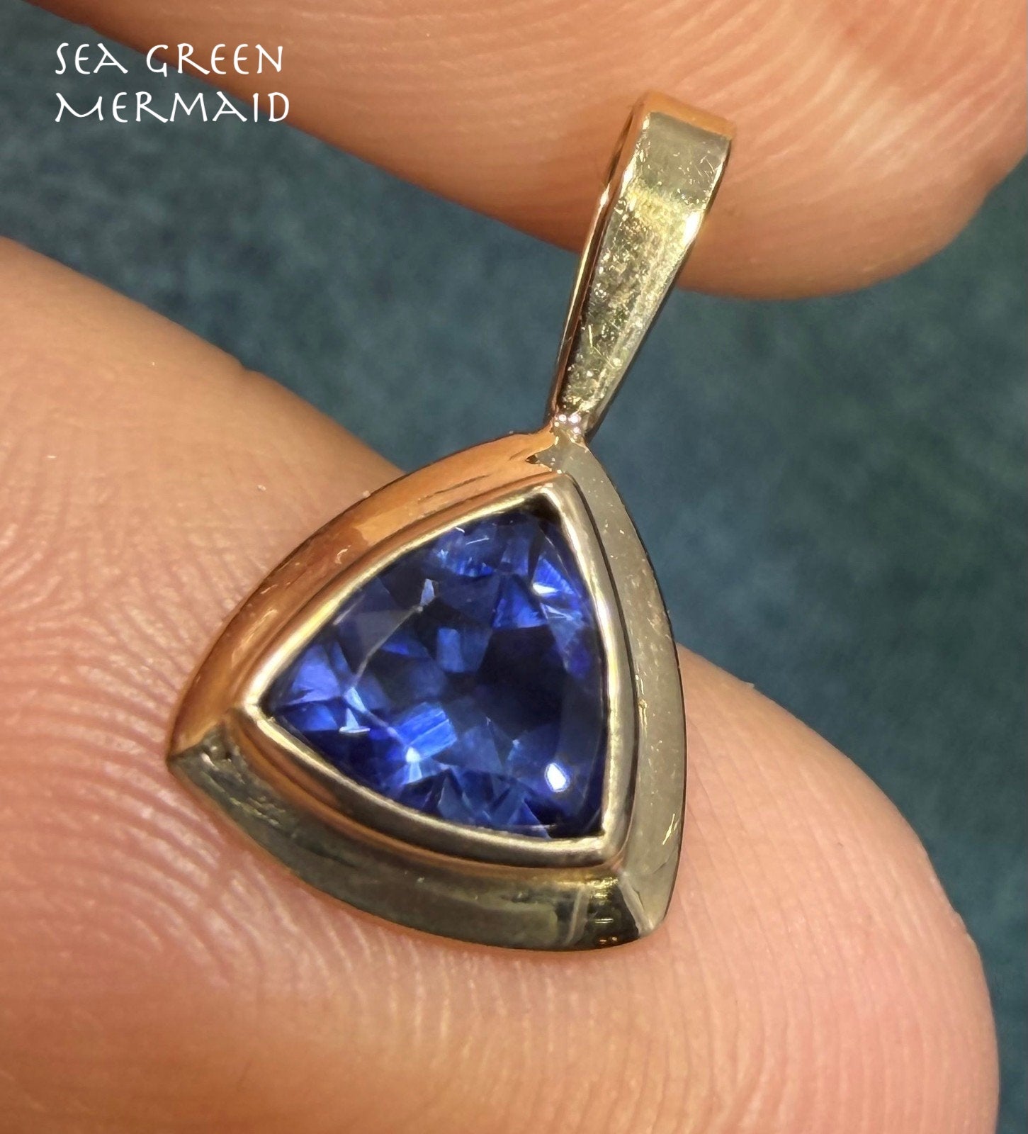 14k Yellow Gold Blue Lab-Created Sapphire Pendant. Trillion Bezel