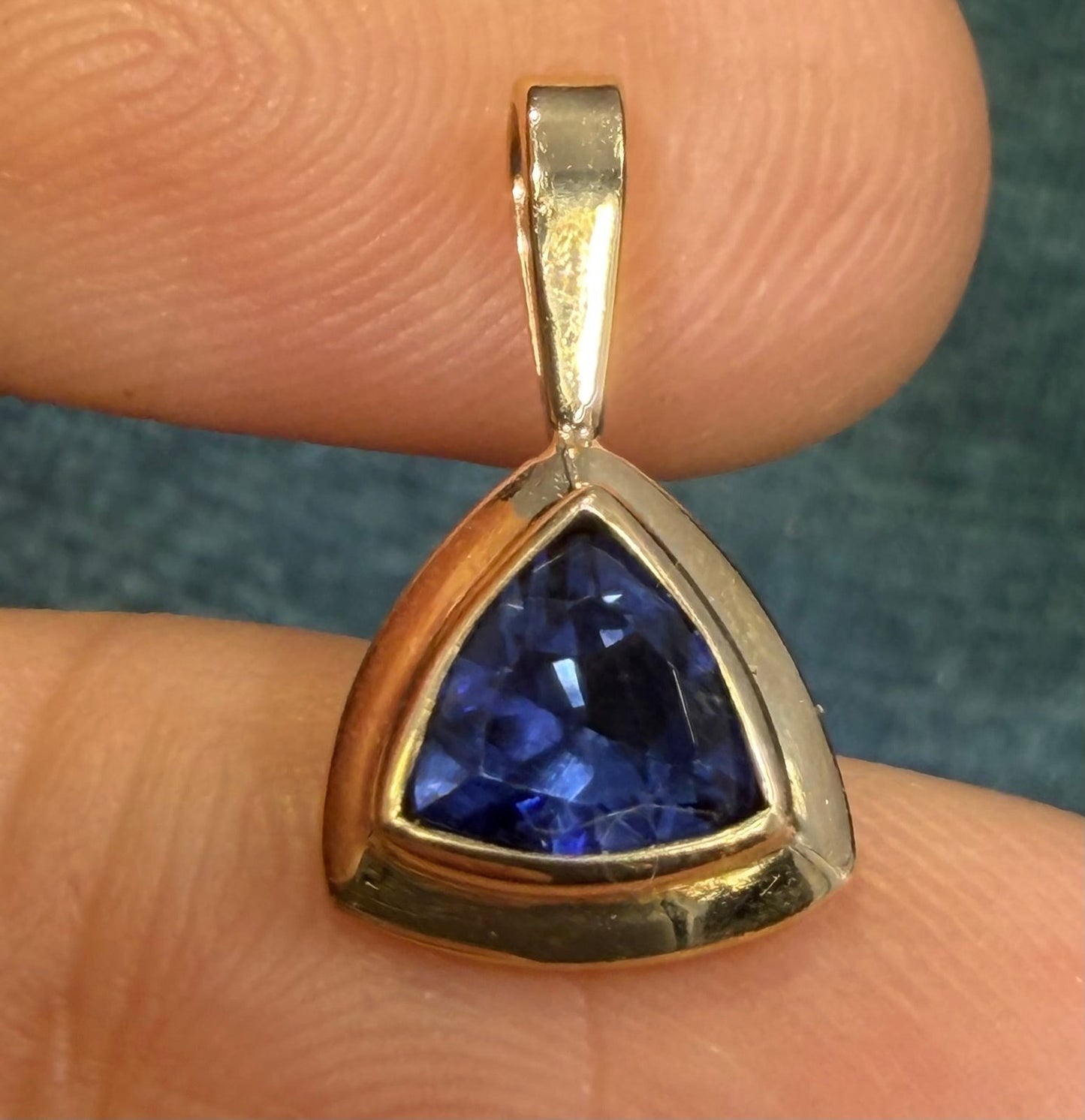 14k Yellow Gold Blue Lab-Created Sapphire Pendant. Trillion Bezel