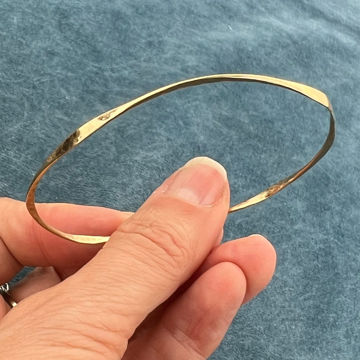 14k Yellow Gold Hammered Twisted Bangle Bracelet. Designer
