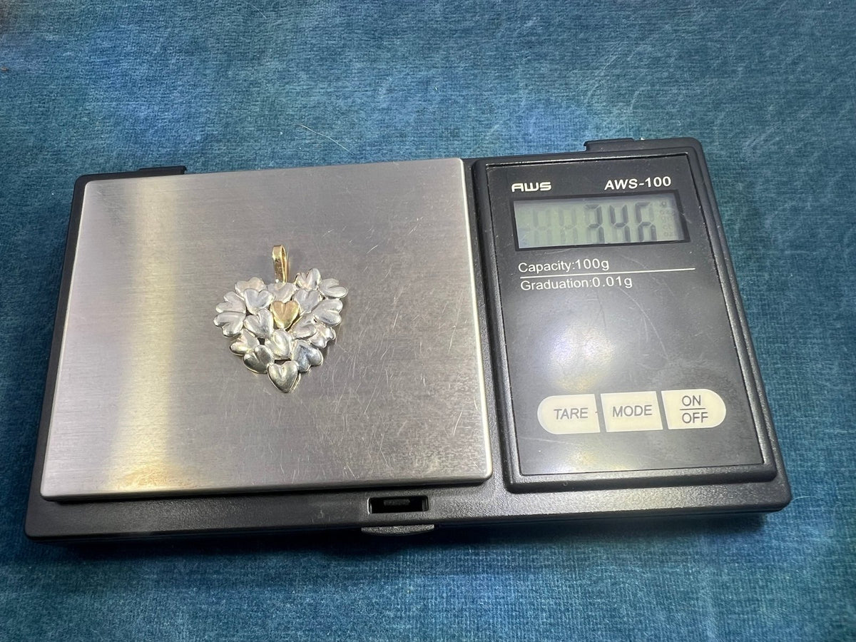 18k + Silver MOVADO Many Hearts Pendant. 1"