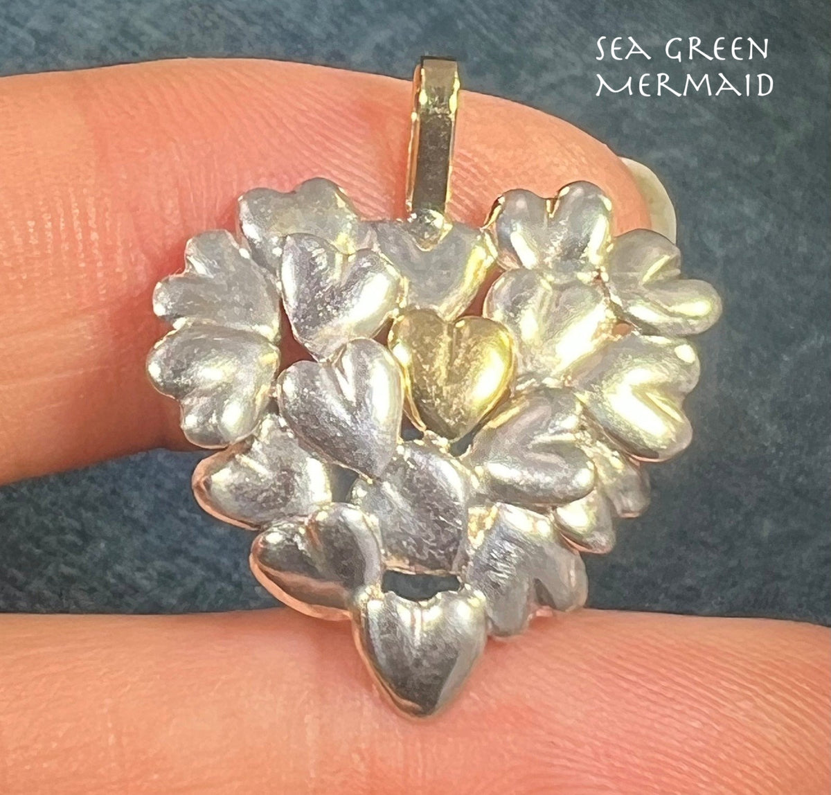 18k + Silver MOVADO Many Hearts Pendant. 1"