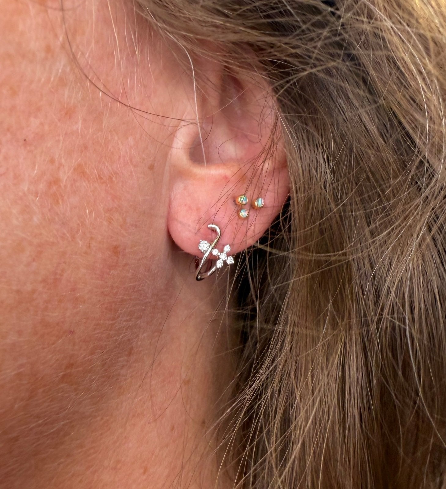 18k White Gold Diamond Flowers Huggies Hoop Earrings. Designer