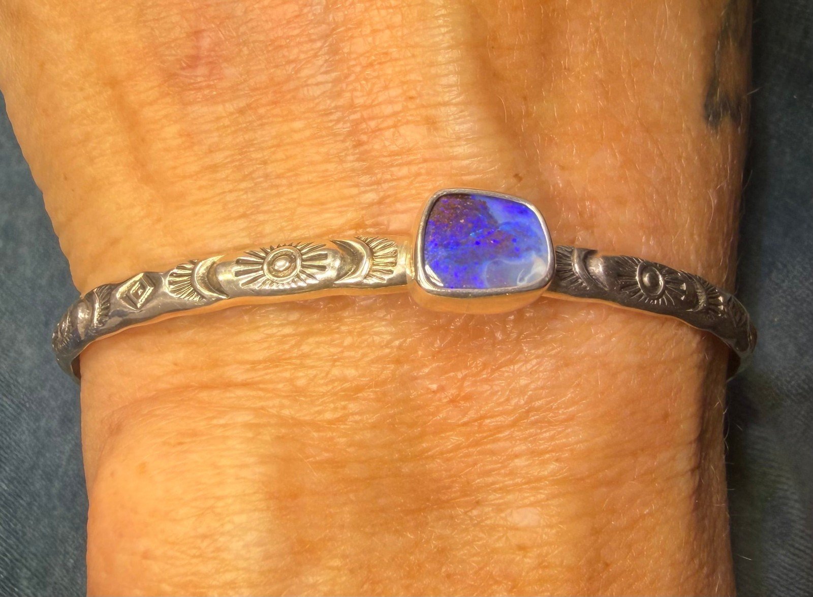 Australian Boulder Opal Artisan Sunburst Cuff Bracelet. Purple Blue