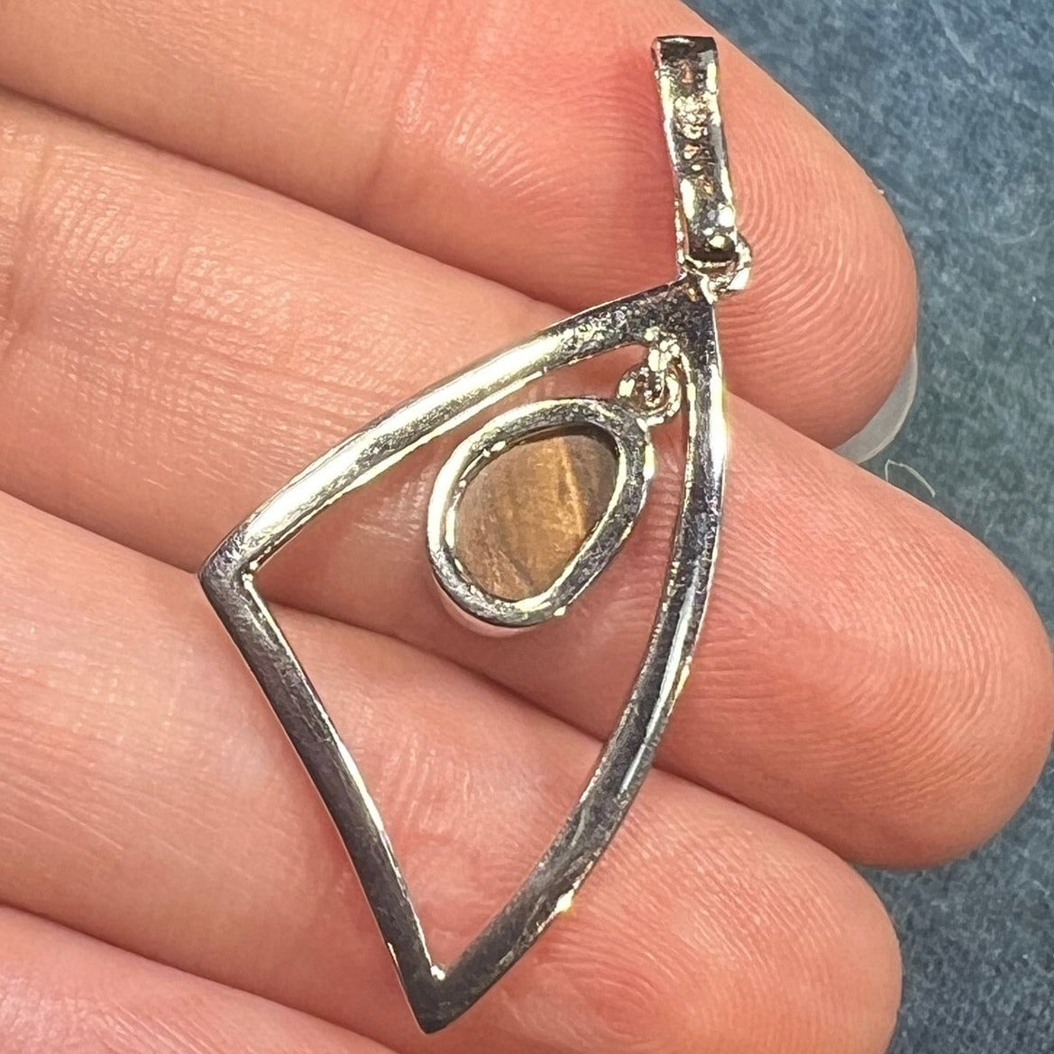 Australian Boulder Opal in Triangle Frame Modern Pendant. Sterling Silver