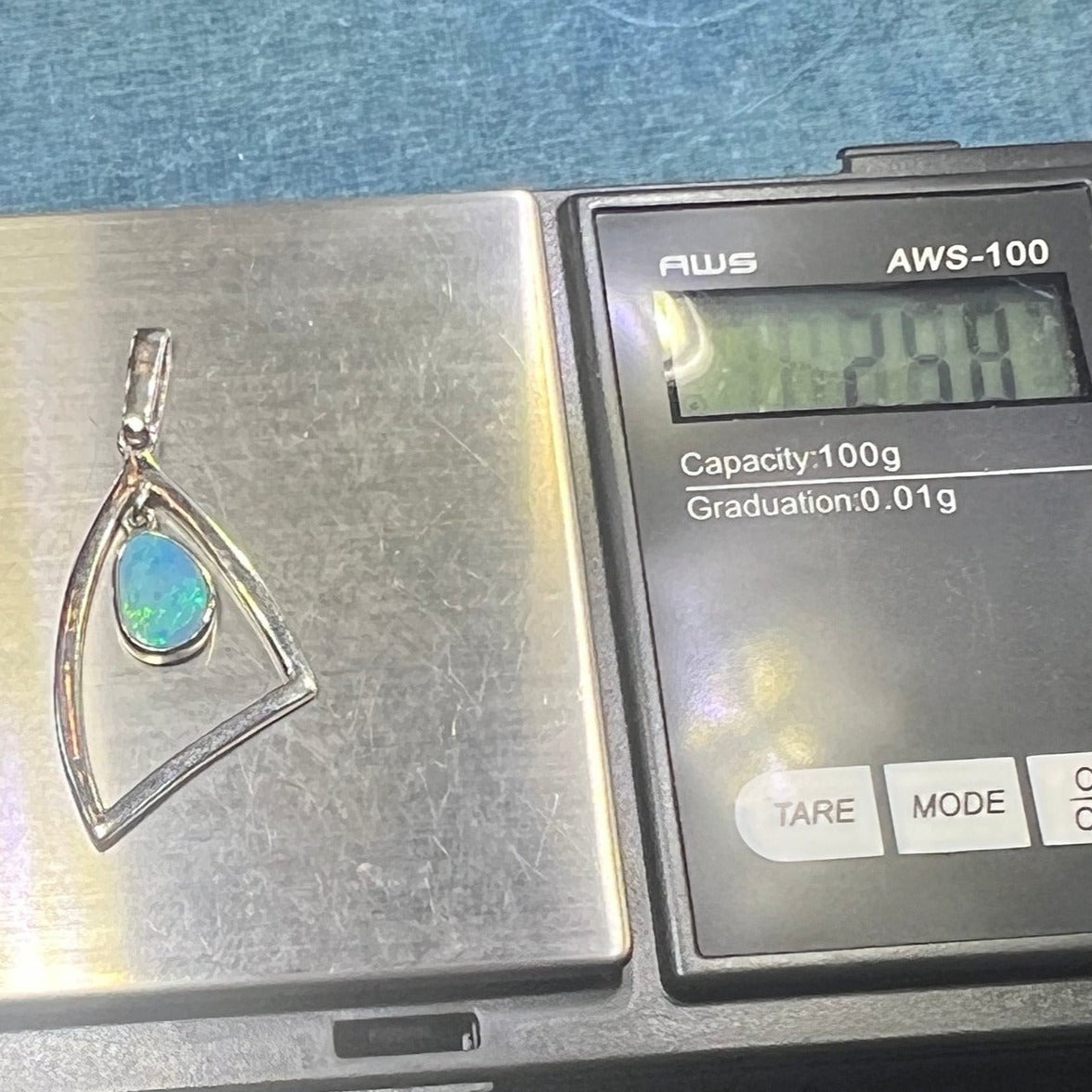 Australian Boulder Opal in Triangle Frame Modern Pendant. Sterling Silver