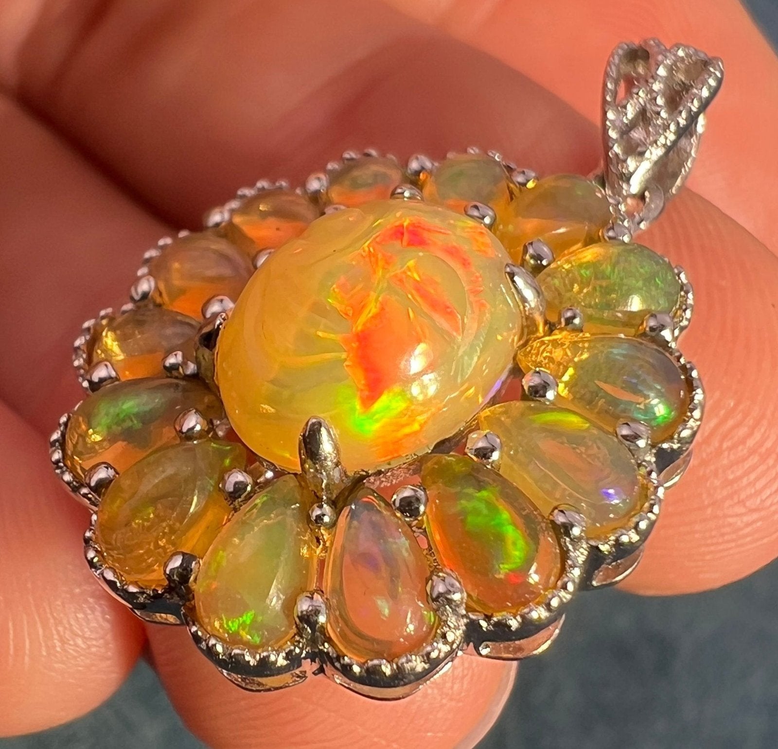 Ethiopian Opal Carved Face Moon Man Sunburst Pendant *Video*