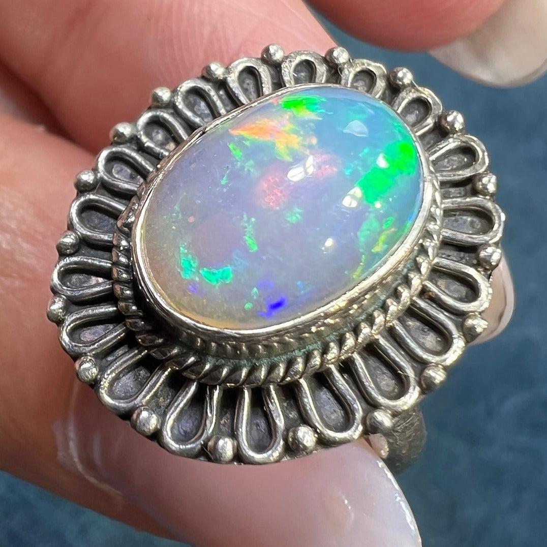 Ethiopian Welo Opal Ring with Flower Petal Bezel Frame. 3/4" *Video*