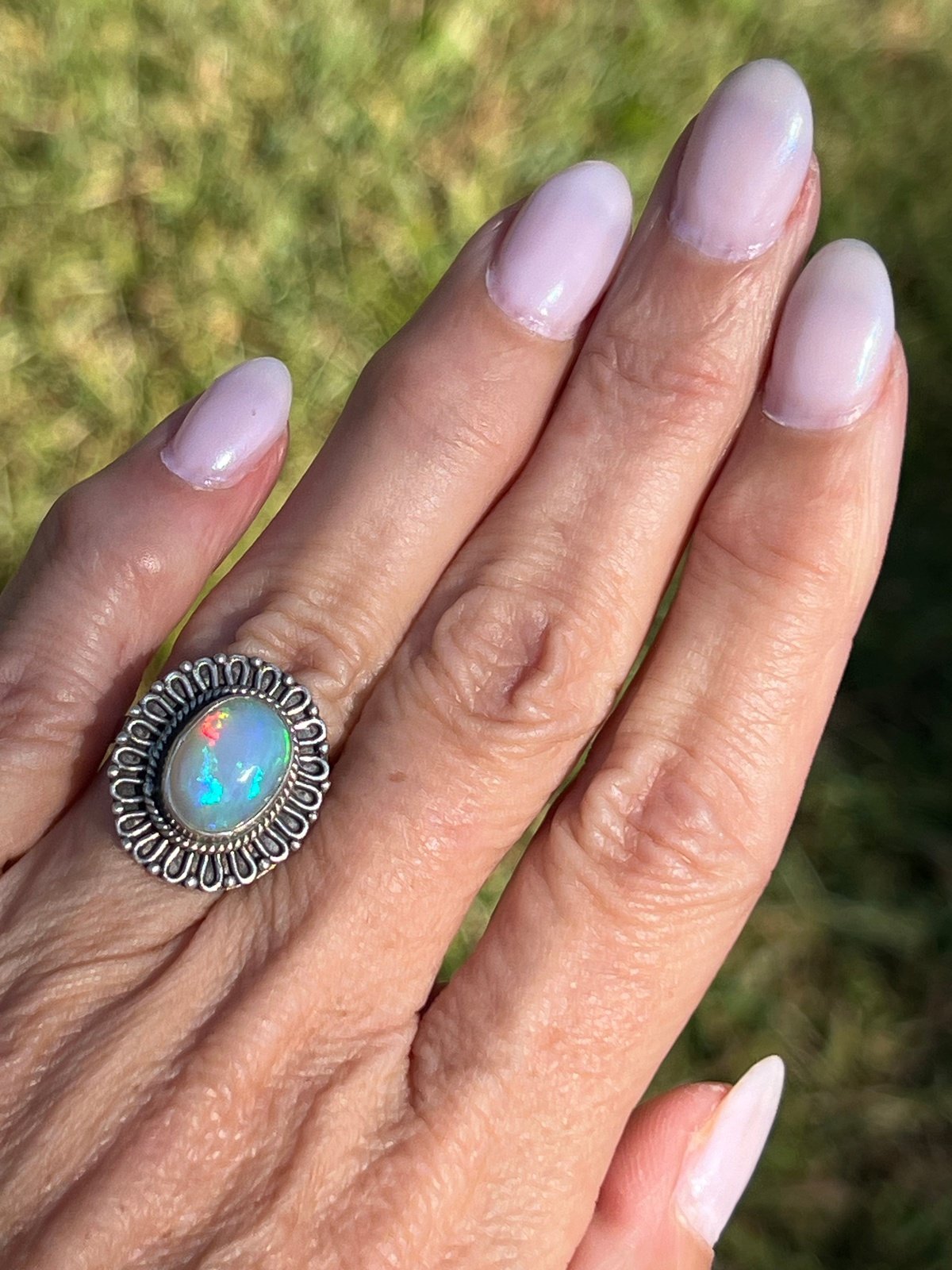 Ethiopian Welo Opal Ring with Flower Petal Bezel Frame. 3/4" *Video*