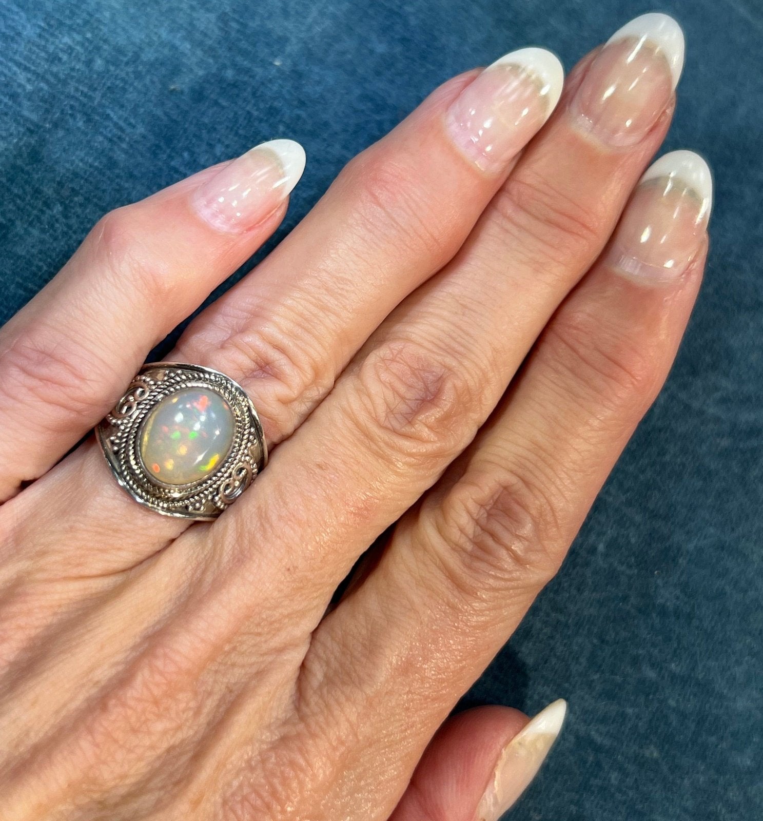 Ethiopian Welo Opal in Silver Bali Bead Ring. Wide Cigar Band