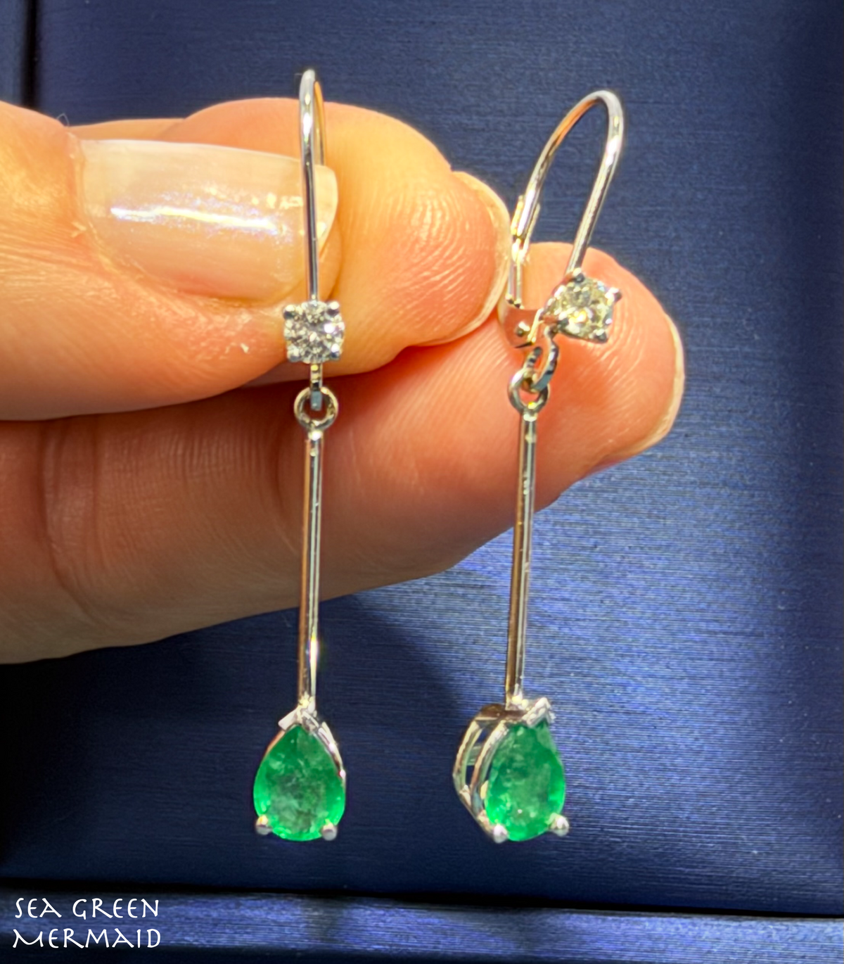 14k White Gold Dangle Earrings w Teardrop Emeralds + Diamonds. Leverback