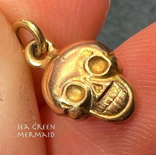 14k Yellow Gold Grinning Skull Pendant. Tiny!