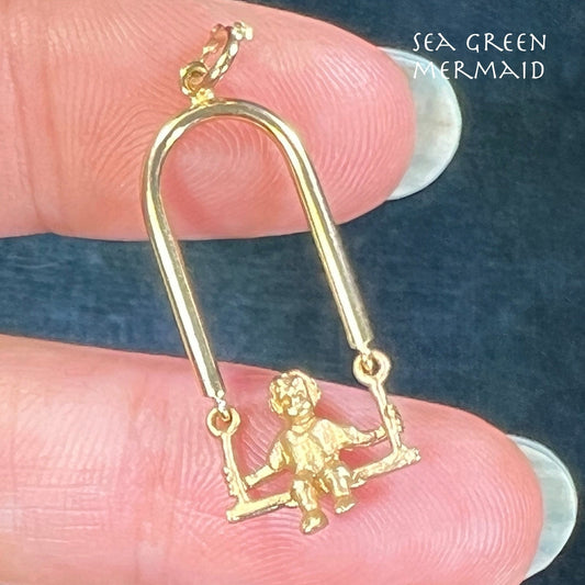 14k Yellow Gold Child on Swing Pendant. Moves! 1.3"