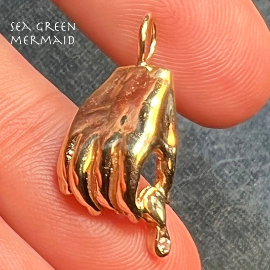 14k Yellow Gold Jeweler's Hand Holding Diamond Loupe Pendant. 1"