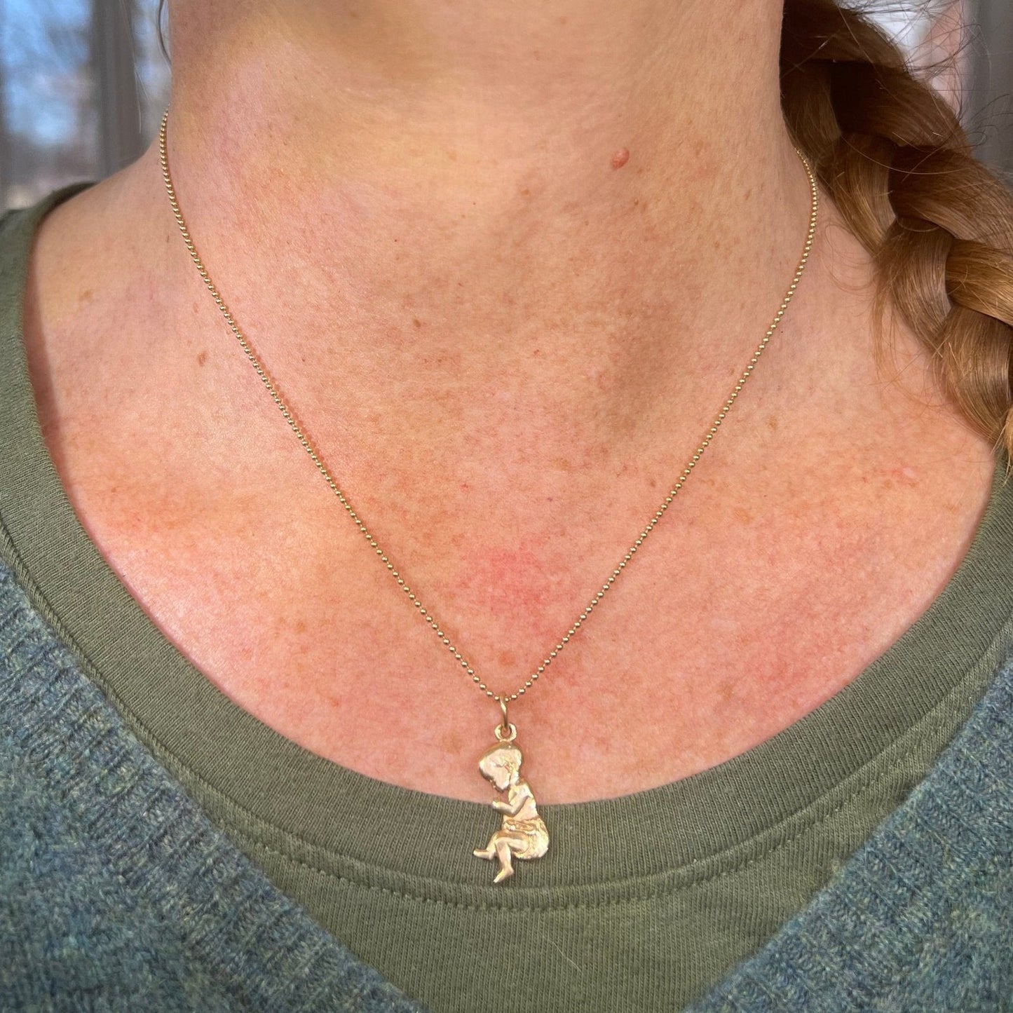 14k Yellow Gold Sleeping Baby Infant Pendant. 1"