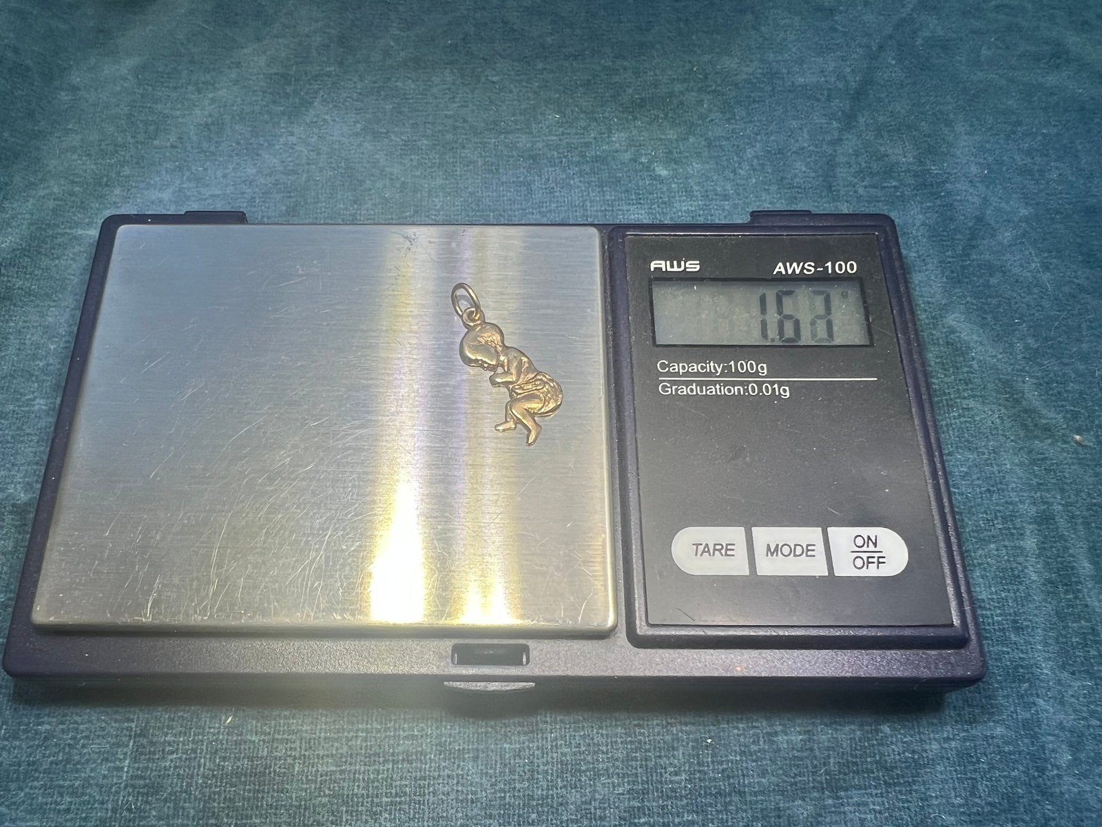 14k Yellow Gold Sleeping Baby Infant Pendant. 1"