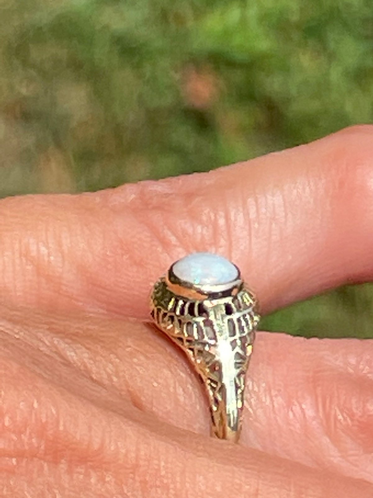 Filigree opal ring top