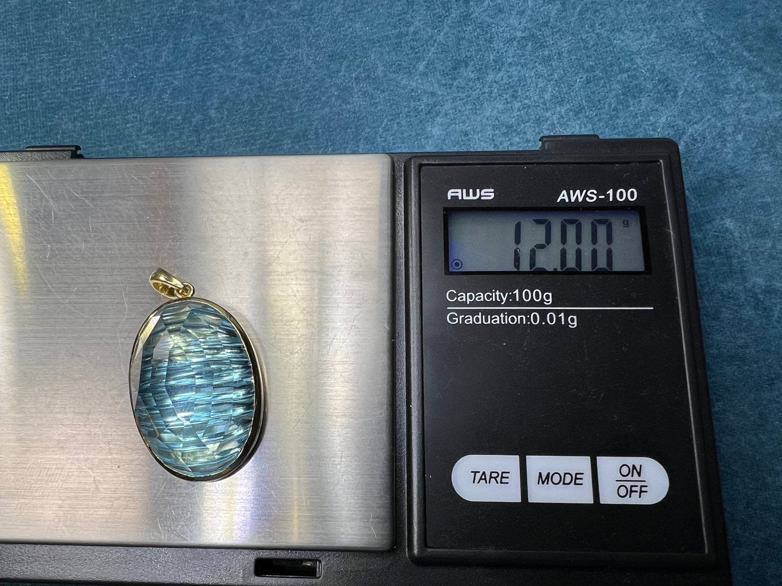 14k Yellow Gold 20 Ct Blue Topaz Fantasy Cut Pendant. 12g + 1.4"