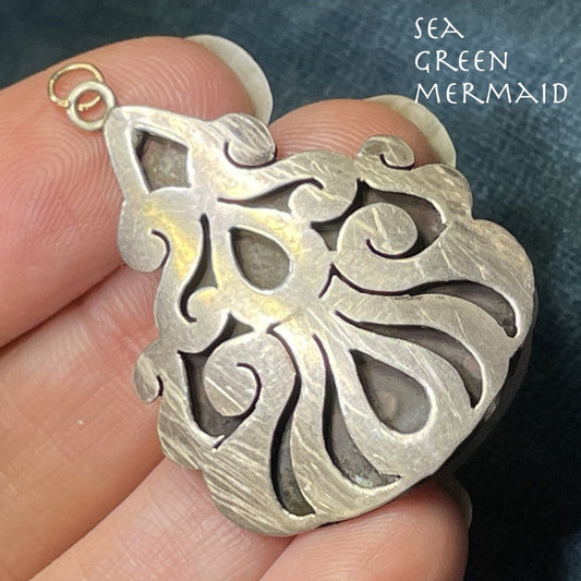 Antique Mexican Medallion Cut-Out Teardrop Pendant. 1.5"