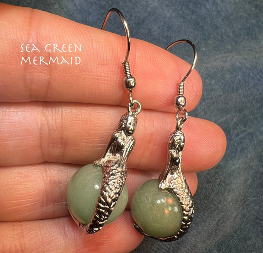 Mermaids Perched on Sea-Green Glass Orb Dangly Earrings. 2"